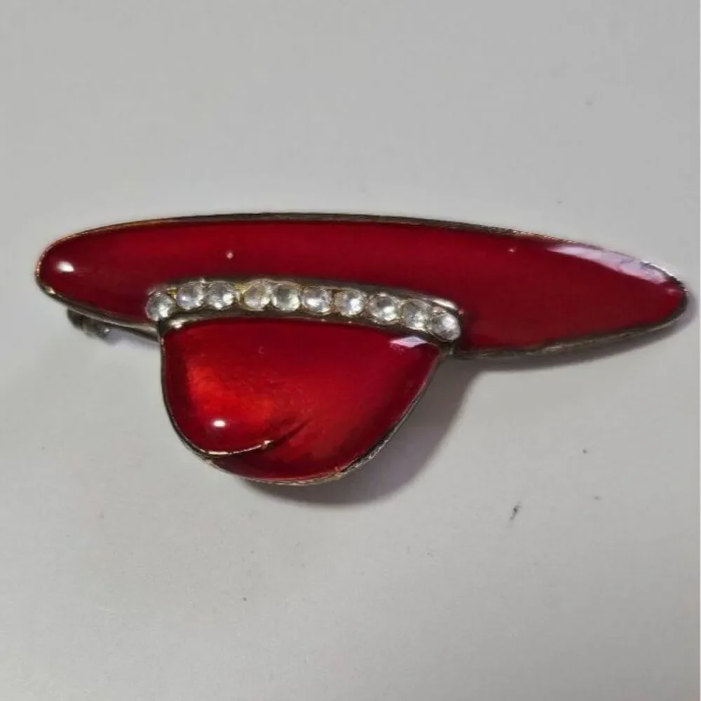 Gold tone red hat society brooch